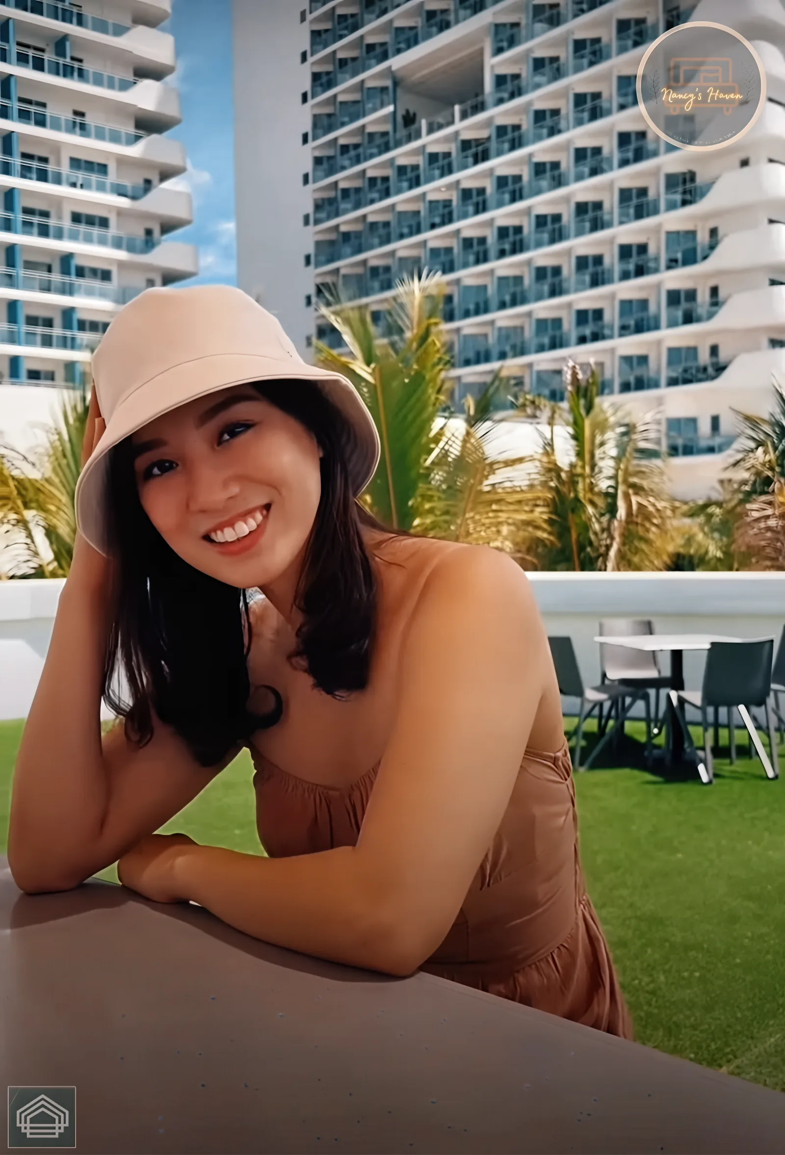 A happy guest enjoying the rooftop and resort views at Nancy's Haven